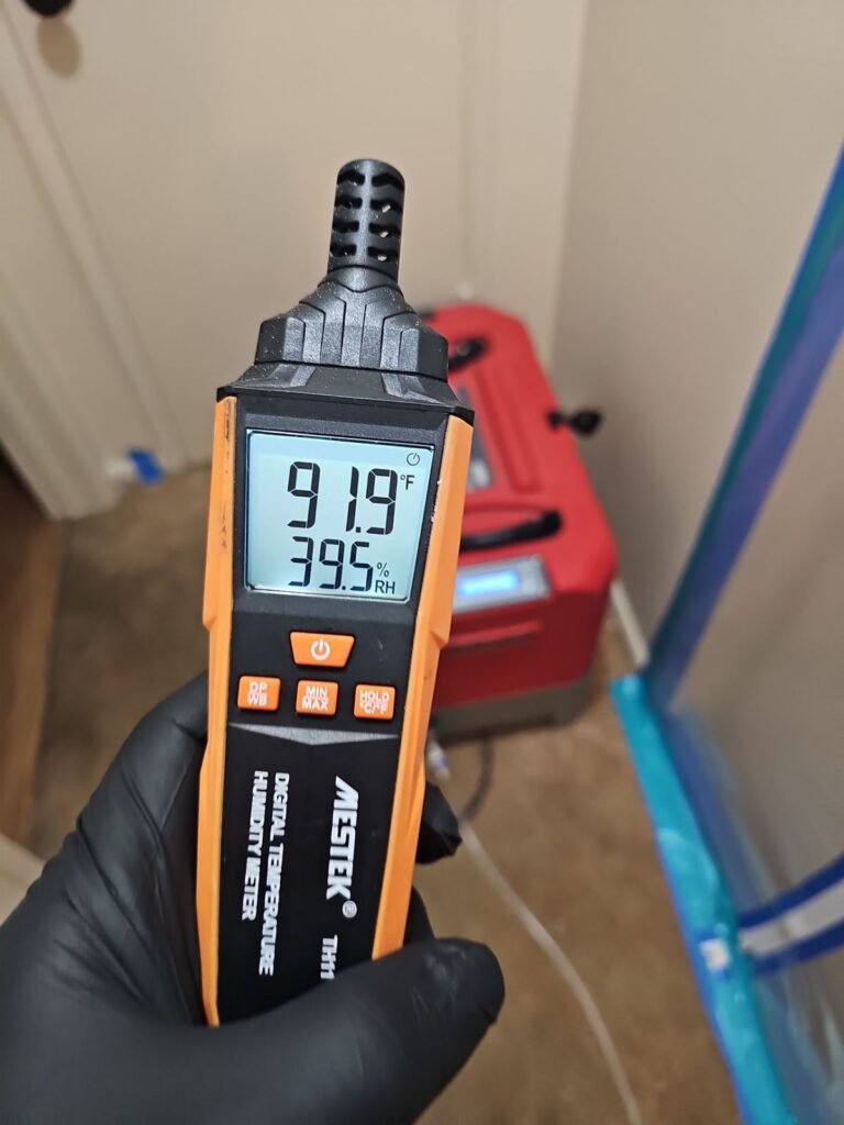 A meter reading 91.9 degrees beside a running dehumidifier in Ventura County